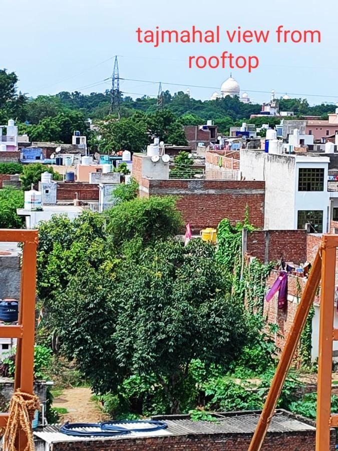 Sunrise Agra-rooftop View Taj Mahal Homestay *